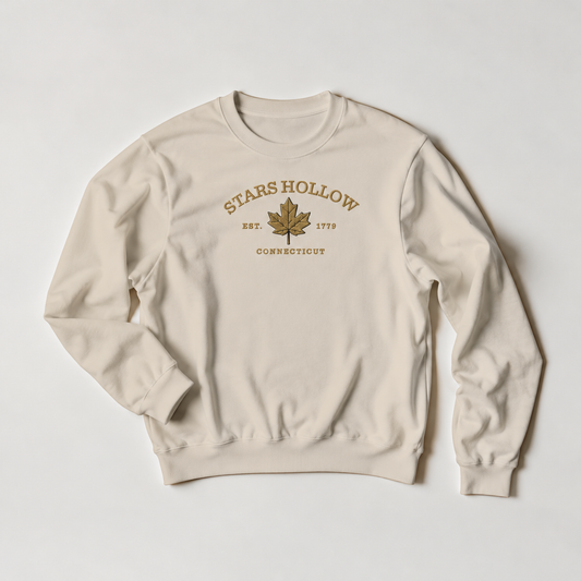 Beige sweatshirt with 'Stars Hollow' text.